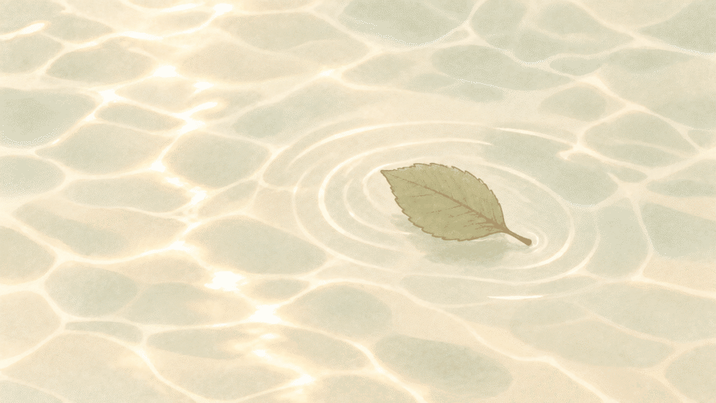 光の反射する穏やかな水面を、木の葉が一枚ゆっくり流れていくイラスト